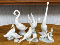 Collection of Seven Nao and One Lladro Geese Figures.