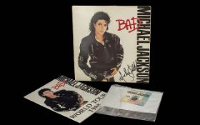 Michael Jackson Interest - signed 'Bad' Album,