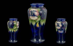 William Moorcroft Signed Tube Lined Blue Pansy Tall Vase. c.1920 - 1925. William Moorcroft Signed to