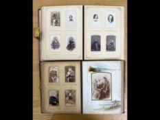 Two Carte de Visite Albums, depicting well attired ladies and gentlemen and children,