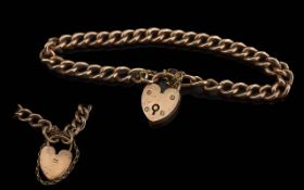 Antique Period - A Fine Quality 9ct Gold Curb Bracelet with Heart Shaped Padlock / Safety Chain.