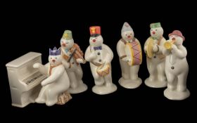 Royal Doulton Snowmen Band Set, to include Bass Drummer, Violinist, Cymbal Player, Drummer,
