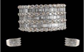 Ladies Pleasing 18ct White Gold Baguette and Brilliant Cut Diamond Set Ring.