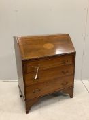 An Edwardian inlaid mahogany bureau fitted three drawers, width 75cm, depth 42cm, height 95cm.