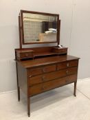 An Edwardian inlaid mahogany dressing chest, width 107cm, depth 50cm, height 156cm. Condition -