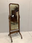 An early 20th century mahogany cheval mirror on fluted down swept feet, width 54cm, height 158cm.