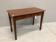 A George III style mahogany side table with two frieze drawers with swan neck brass handles and