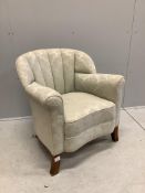 An Art Deco style upholstered tub shaped armchair, width 70cm, depth 68cm, height 76cm.