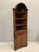 A Queen Anne Revival yew standing corner cupboard, width 66cm, depth 34cm, height 182cm. Condition -