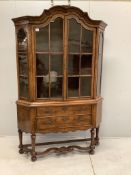An 18th century style Dutch walnut display cabinet, width 136cm, depth 33cm, height 208cm.