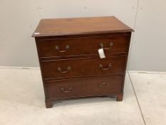 An early 20th century mahogany chest with a moulded top, three long drawers with brass loop