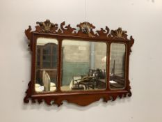 A George III style mahogany, parcel gilt triple plate fret cut wall mirror with Prince of Wales