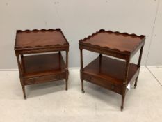 A pair of reproduction mahogany two tier tables fitted slides on ring turned legs, width 48cm, depth