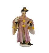 A Meissen figure of Avvocato or a Masquerader, c.1745, modelled by J. J. Kandler, the figure wearing