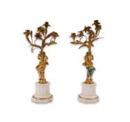 A pair of Victorian style ormolu and white marble candelabra, with flower stem three light branches,
