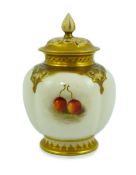 A Royal Worcester fruit painted pot pourri and cover, by Ricketts, the lobed body on a moulded foot,