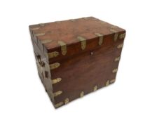 A George III brass bound mahogany strong box of rectangular form, with brass loop handles and