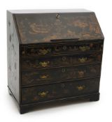 A George II and later japanned oak bureau with chinoiserie figures in landscapes, birds and flowers,