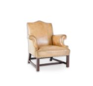 A George III mahogany wing armchair with later pale tan leather upholstery, on squared legs, 85cm