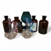 A collection of coloured glass including a pair of Venetian liqueur decanters and oversized French