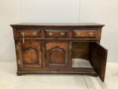 An 18th century oak low dresser, width 142cm, depth 55cm, height 88cm. Condition - fair