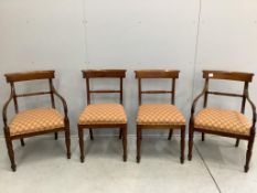 A set of eight Regency style mahogany dining chairs, two with arms. Condition - fair to good