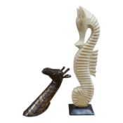 A large seahorse model and a stylised metal giraffe, largest 82cm high. Condition - fair/good