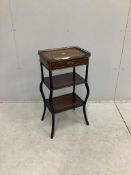 A late 19th century French ebonised and amboyna three tier etagere, width 41cm, depth 30cm, height