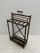 A late Victorian bamboo stick stand, width 56cm, height 98cm. Condition - poor to fair