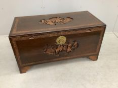 A Chinese rectangular carved camphor wood trunk, width 93cm, depth 45cm, height 50cm. Condition -