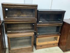 Six Globe Wernicke style oak and mahogany bookcase sections, largest width 86cm.Provenance -