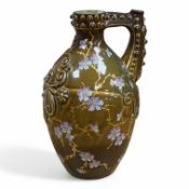 A large Zsolnay brown bodied ewer, with gilt decoration, 33cm high. Condition - good