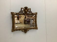 A Victorian giltwood and composition 'lion's mask' wall mirror, width 86cm, height 84cm. Condition -