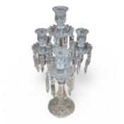 A Baccarat style three branch four light glass candelabrum, 50cm high. Condition - good