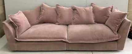 A Contemporary Sofology salmon pink sofa, width 275cm, depth 100cm, height 71cm. Condition - fair