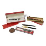 A collection of various pens and a H.N. Ansell medal. Condition - varies