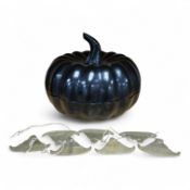 A black lacquer pumpkin shaped box and cover and seven brass hanging ornaments, box 21cm high.