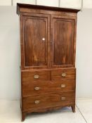 A Regency mahogany linen press, width 120cm, depth 56cm, height 211cm. Condition - fair, interior