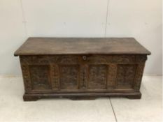 A 17th century and later strapwork carved oak coffer, width 160cm, depth 61cm, height 70cm.