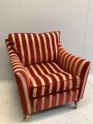 A Contemporary club armchair upholstered in Colefax & Fowler striped fabric, width 88cm, depth 89cm,