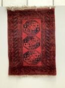 Two Afghan rugs and a flatweave mat, largest 200 x 140cm. Condition - fair