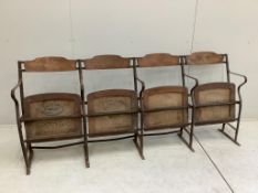 Three vintage French wrought iron and beech folding cinema seat rows, each width 193cm, height 84cm.