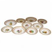 A set of nine Minton Victorian bone china fruit and flower decorated dishes, with gilt borders,