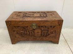 A Chinese carved camphor wood trunk, width 101cm, depth 49cm, height 59cm. Condition - fair to good