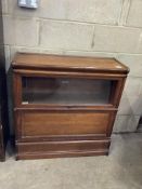 A Globe Wernicke oak two section bookcase, width 86cm, depth 30cm, height 88cm.Provenance - Harrison