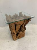 A driftwood glass top coffee table, height 50cm. Condition - fair