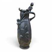 An Art Nouveau large pewter ewer, singed W. Herring, 47cm tall. Condition - poor