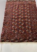 A Tekke rug, 148 x 106cm, together with a Caucasian rug and an Afghan rug. Condition - poor to fair