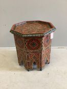 A Moorish style painted octagonal table, width 52cm, height 55cm. Condition - fair