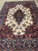 A modern Persian design ivory ground carpet, 300 x 198cm. Condition - good